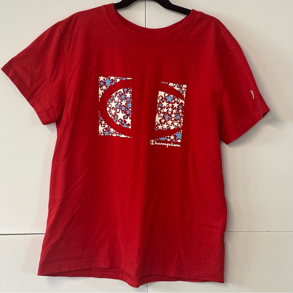 Women’s Champion red tee shirt with stars. Size Small.